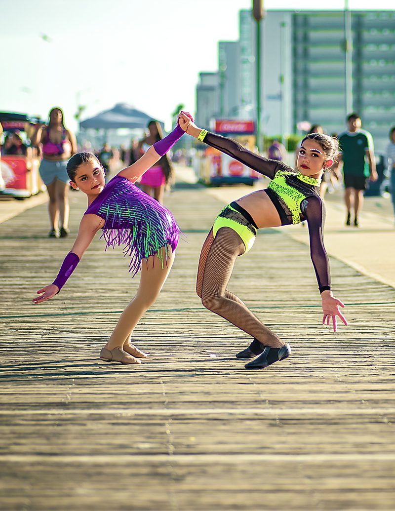 Sisters posing together on the Boardwalk in Wildwood NJ 
