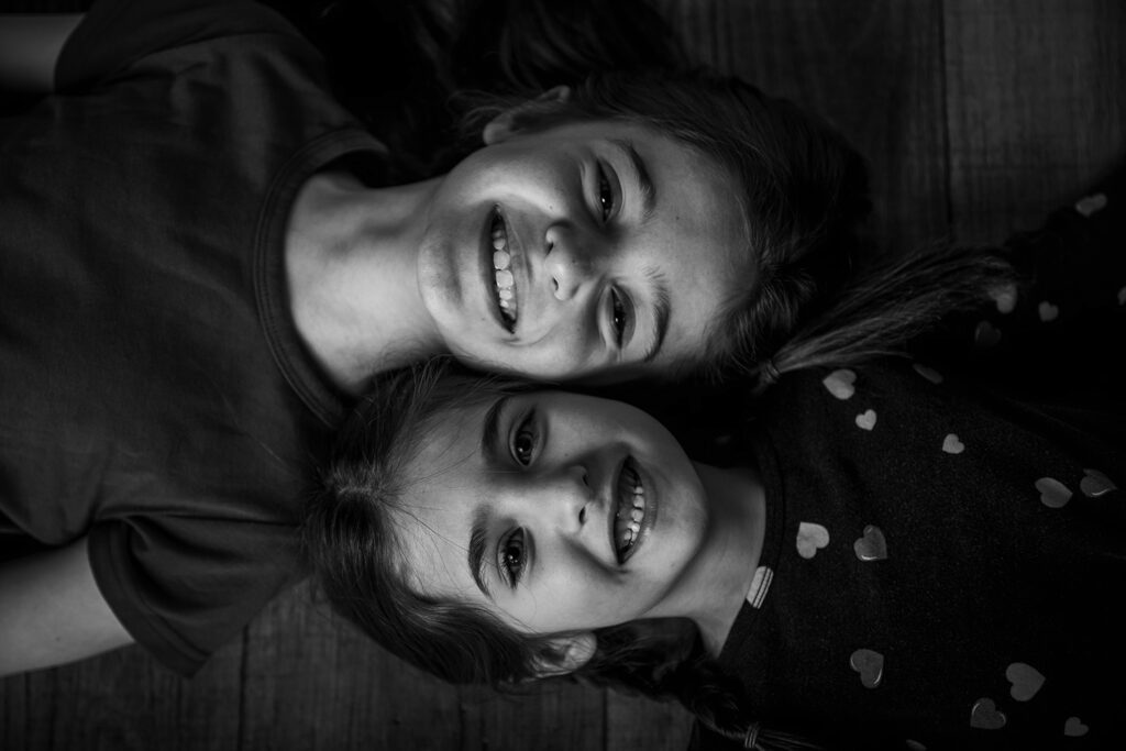 sisters posing together for their personality session. 